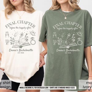 May include: Ivory and moss green oversized t-shirts with the text "FINAL CHAPTER before the happily after" and "Emma's Bachelorette EST 2026". The shirts have a graphic design of a book, ring, and other wedding-related icons.