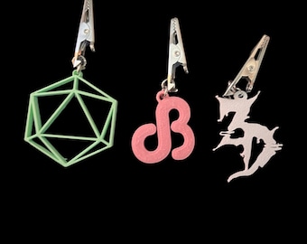 Dj logo inspired hat charms!! Zeds dead, excision, pretty lights, daily bread, Charles the first, deep dark dangerous, odesza!