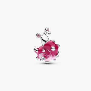 May include: A silver charm shaped like a snail with a vibrant pink enameled shell featuring raised silver dots and small clear stones. The snail has two silver antennae topped with small pink stones. The letters MJ appear in the top corner.