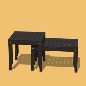 May include: Two black wooden nesting tables. The tables have a slatted top design and are supported by four legs. The larger table is approximately 18 inches wide and 18 inches deep, while the smaller table is about 12 inches wide and 12 inches deep.