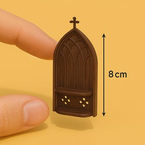 May include: A miniature wooden church with a pointed roof and a cross on top. The church has a small shelf and decorative holes. The church is 8 cm tall.