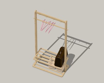 May include: A wooden coat rack with a shelf for shoes and a hanging rod for clothes. Pink hangers are hanging on the rod. A brown suitcase is on the shelf.