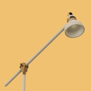 May include: A white desk lamp with a gold base and a white shade. The lamp is adjustable and can be positioned in different directions.