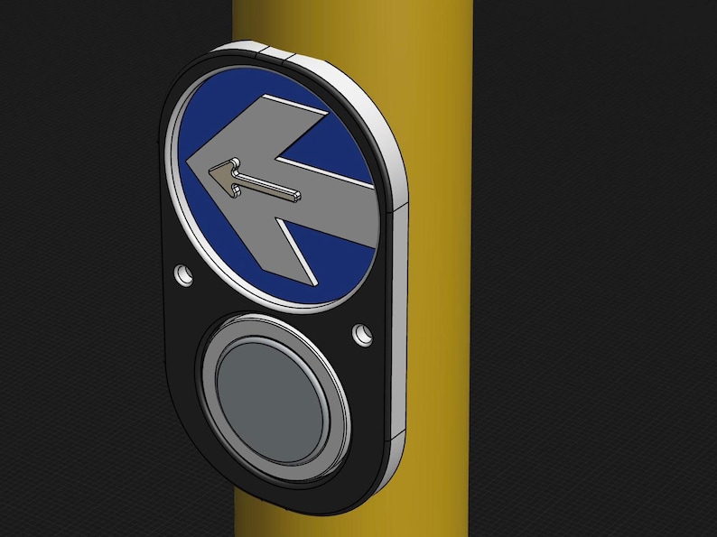May include: A black and silver push button with a blue and silver arrow pointing left. The button is mounted on a yellow pole.