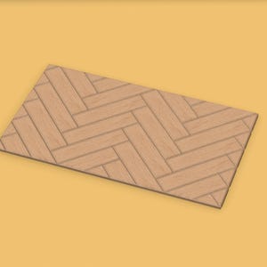Op de afbeelding: Een rechthoekige houten tegel met een visgraatpatroon. De tegel is gemaakt van lichtbruin hout en staat tegen een gele achtergrond. De houtnerf is zichtbaar en het patroon is symmetrisch.