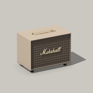 May include: A cream-colored Marshall portable Bluetooth speaker with a brown diamond-patterned grill and the word "Marshall" in gold lettering.