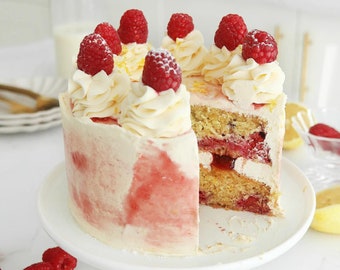 The BEST Lemon Raspberry Cake with Lemon Glaze and Fresh Raspberry Filling RECIPE