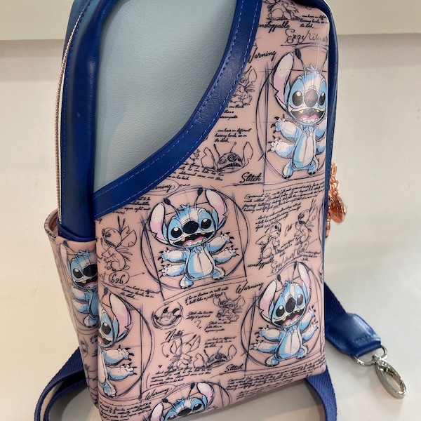 Chaotic Alien Dog 626 Sling - Pink and Blue Vinyl Purse - Cute Crossbody Mini-Backpack - Novelty Amusment Park Gift -  Waterproof Travel Bag