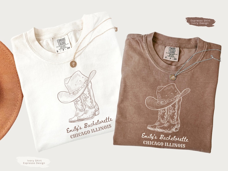 May include: Two t-shirts, one ivory and one espresso, each with a cowboy hat and boot design. The text "Emily's Bachelorette CHICAGO ILLINOIS" is printed below the graphic. Each shirt has a gold necklace.