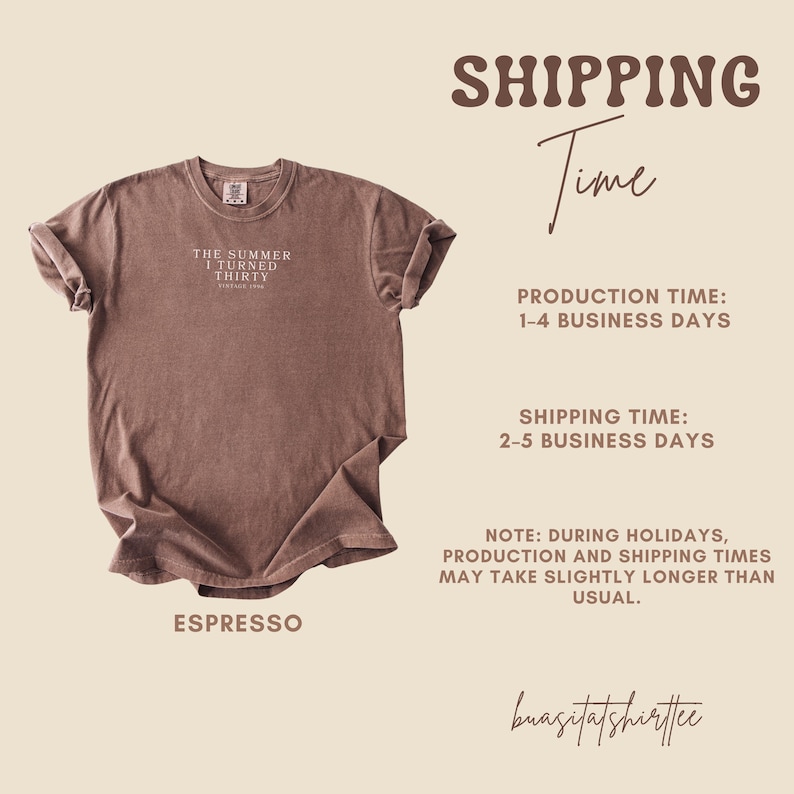 May include: Espresso-colored t-shirt with rolled sleeves. The shirt features the text "THE SUMMER I TURNED THIRTY" in a small, centered font. The shirt is a vintage style and is likely made of soft cotton.