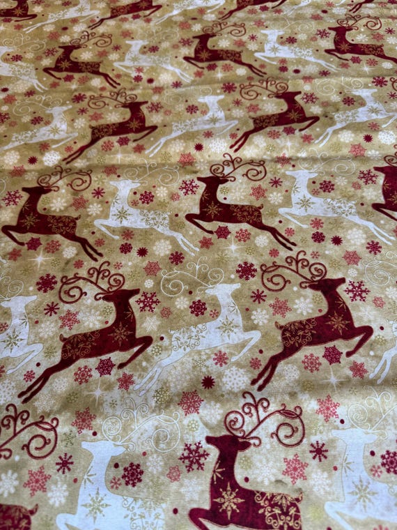 Stonehenge Reindeer Prance – Holiday Fabric by Deborah Edwards for Northcott 160