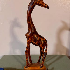 Beautiful hand carved wooden giraffe