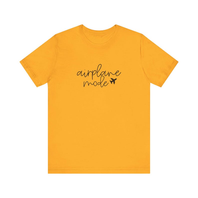 Women’s 'Airplane Mode' graphic tee featuring cursive text and a small airplane. Ideal vacation shirt or adventurer gift. Lightweight and perfect for travel lovers.