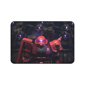 May include: A red robot with a purple eye stands in front of a line of other robots. The robots are all dark gray and have purple eyes. The red robot is in the center of the image and is the focus of the image.