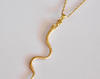 Snake pendant or necklace with diamond
