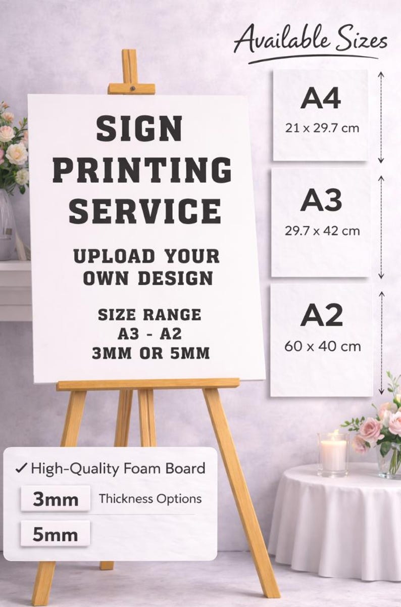 May include: A white sign on a wooden easel advertising a sign printing service. The sign displays text: "SIGN PRINTING SERVICE, UPLOAD YOUR OWN DESIGN, SIZE RANGE A3 - A2, 3MM OR 5MM." Available sizes are A4 (8.3 x 11.7 inches), A3 (11.7 x 16.5 inches), and A2 (23.6 x 15.7 inches).