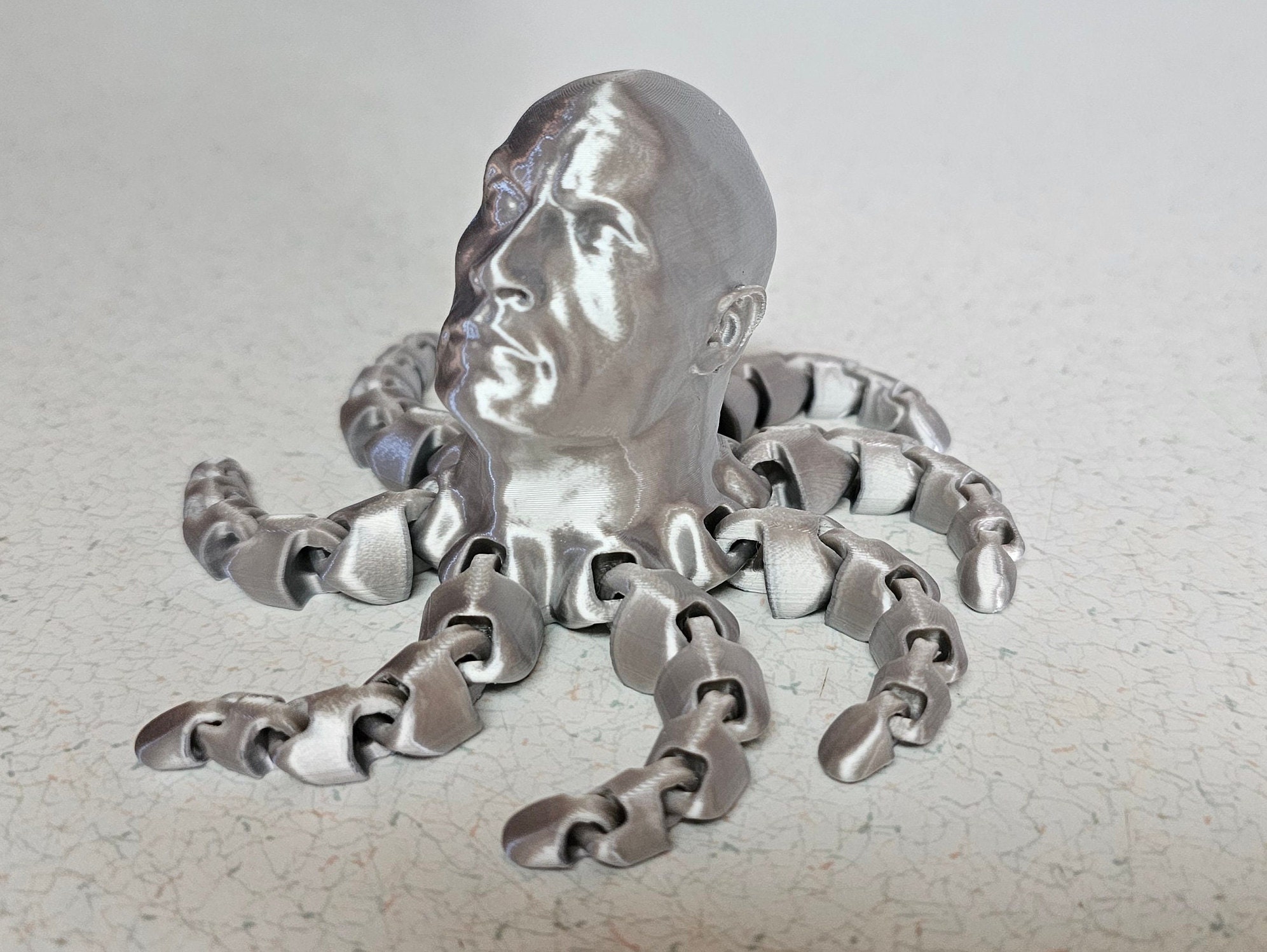 Generic 3D Printed Rocktopus Fidget Toy, Articulated Stress Relief Aid, Gold Plastic