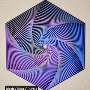 May include: A hexagonal wall art piece with a swirling pattern of black, blue, and purple stripes. The stripes create a hypnotic effect as they spiral inward.