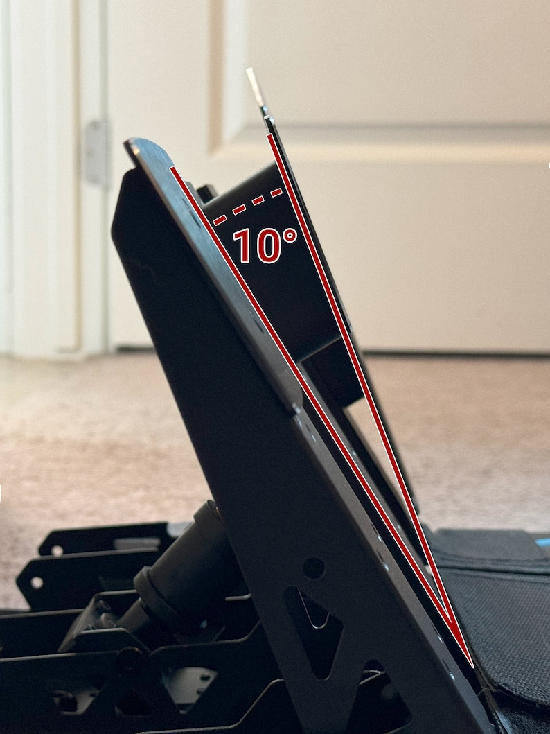 May include: A black metal desk stand with a 10-degree angle, designed to hold a laptop or tablet.