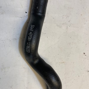 May include: Black rubber hose with the text "SA43 >EPDM< 121786237" printed on the side.