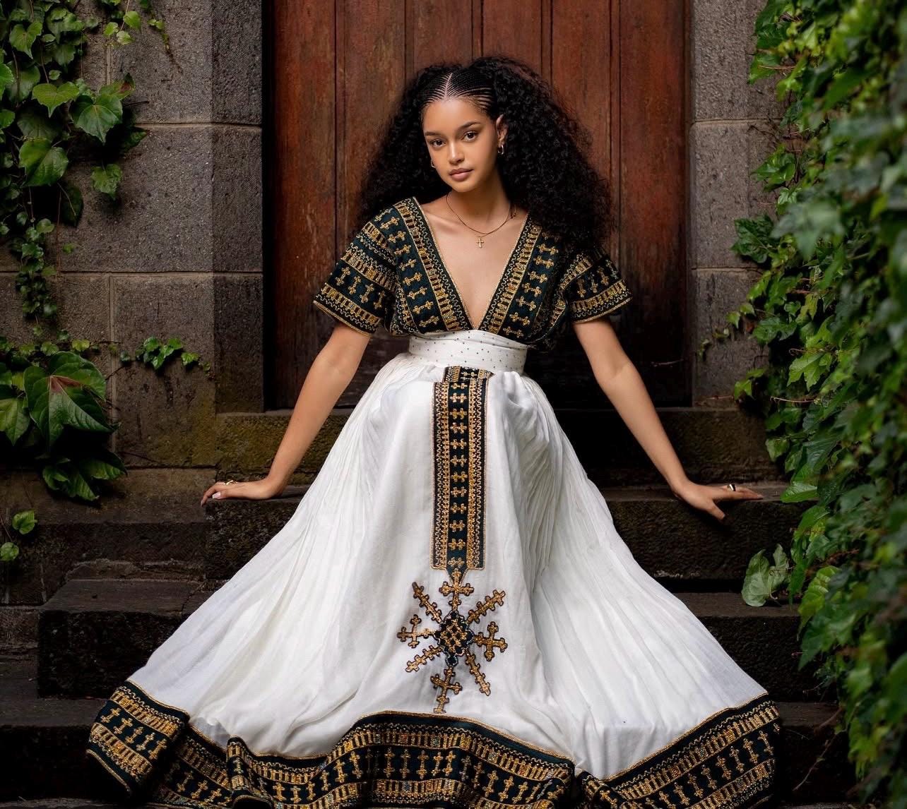 green emerald velvet dress Ethiopian Graduation Dress – Modern Habesha Kemis with Custom Tibeb Bo –  Habesha Dresses Store main image 0
