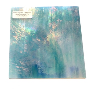 May include: White Sky Blue Luminescent Prisma Wemacha 1/4" glass tile with iridescent blue, green, and white colors. From WindSong Mosaics.