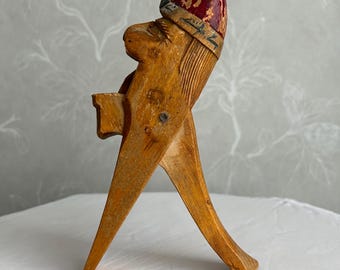 Hand carved Norwegian nutcracker with red head men antique wooden handmade kitchen supply