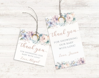 May include: Two thank you tags with floral designs and the text "Thank you for showering our baby with love!"  One tag says "Love, Abigail" and the other says "Love, Jessica".