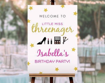 May include: White sign with gold glitter text that says "Welcome to Little Miss Three-nager Isabella's Birthday Party!" with gold stars and makeup icons.