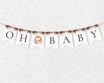 May include: A white banner with brown coffee bean accents reads "OH BABY" with a coffee cup with a heart design in the middle.