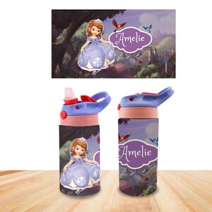May include: A water bottle with a purple and pink design, featuring a cartoon princess in a purple dress. The bottle has a flip-top lid and the name "Amelie". The background shows a forest scene with birds.
