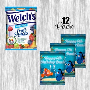 May include: A 12-pack of Welch's Mixed Fruit Fruit Snacks, with a bag featuring various fruits. Also included are three snack packs with the text "Happy 6th Birthday Dani" and cartoon characters.