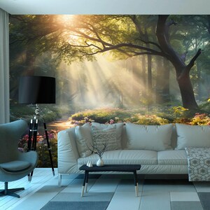 May include: A scenic forest mural with sunlight streaming through the trees. The image features a white sofa, a black lamp, and a modern chair. The room has a light-colored rug and a small black table.