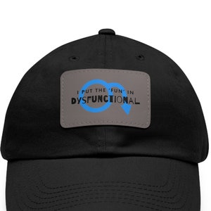 May include: Black baseball cap with a gray patch that says "I put the fun in dysfunctional" with a blue infinity symbol.