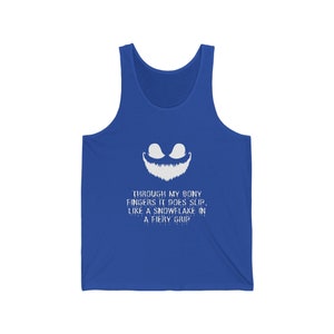 May include: Royal blue sleeveless tank top with a white graphic of a smiling face and the text "THROUGH MY BONY FINGERS IT DOES SLIP, LIKE A SNOWFLAKE IN A FIERY GRIP".