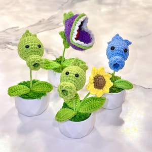 Lanzaguisantes y mordedor de ganchillo hechos a mano en maceta: decoración de Plantas vs. Zombies