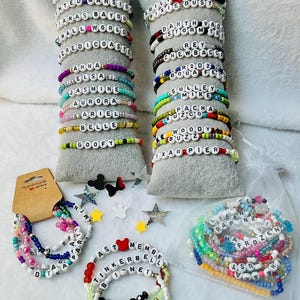 Disney Park inspired trading/collecting /gifting bracelets. Customize a fav ride/attraction/character/food or be surprised by random ones !