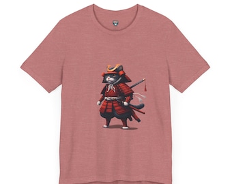 May include: A heather red t-shirt with a black and white cat wearing red samurai armor and holding a sword. The cat is standing on a light brown background.