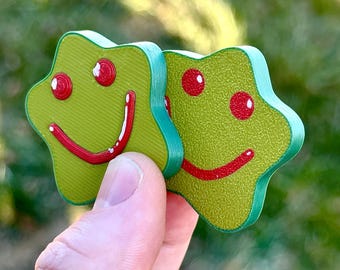 Juguete antiestrés Pickle Slider ~ Deslizador magnético en forma de estrella con agarre texturizado