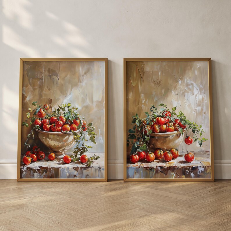May include: Two framed paintings of still life arrangements featuring red tomatoes in a bowl with green vines. The paintings have a rustic, vintage aesthetic.