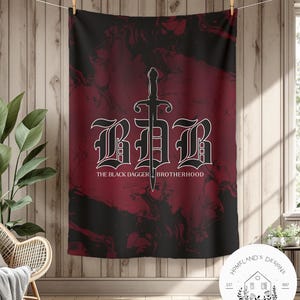 May include: A black and red tapestry with the text "BBB" in a gothic font, with a sword design. The words "THE BLACK DAGGER BROTHERHOOD" are below the letters. The tapestry is hanging on a wooden wall.