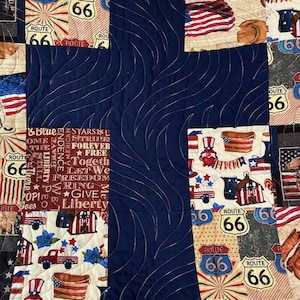 Red, white, blue handmade lap/throw quilt.