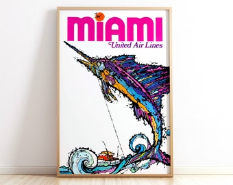 Puede incluir: Un póster de viaje vintage enmarcado para Miami de United Air Lines. El póster presenta una colorida ilustración de un marlín saltando del océano. La palabra "MIAMI" está en letras rosas grandes.