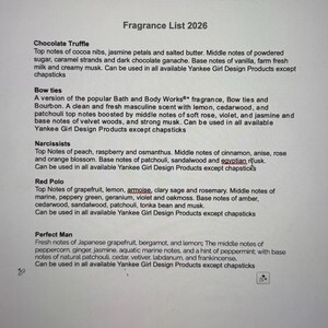 May include: A white paper with a fragrance list titled "Fragrance List 2026". The list includes descriptions of scents like "Chocolate Truffle", "Bow ties", "Narcissists", "Red Polo", and "Perfect Man".