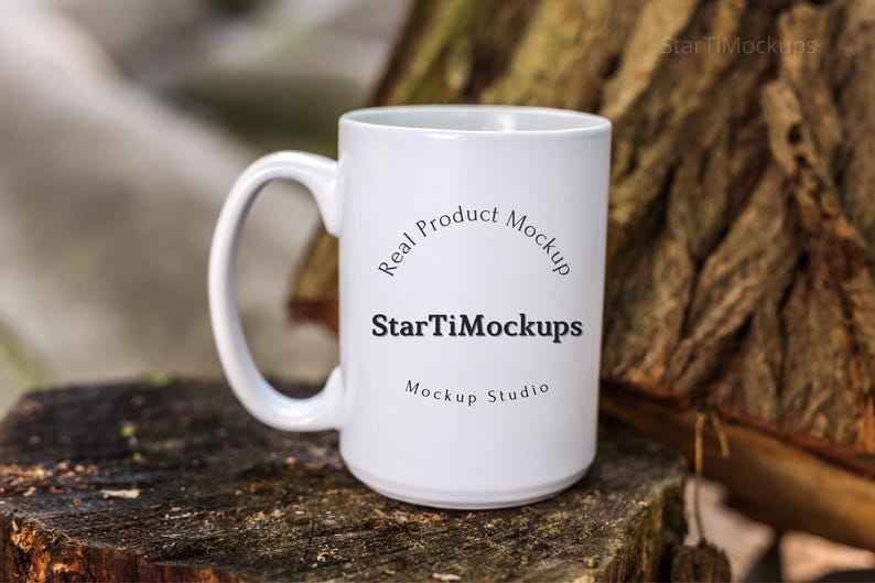 May include: White ceramic mug with a black handle. The mug has the text "Real Product Mockup" and "StarTiMockups Mockup Studio" printed on it.
