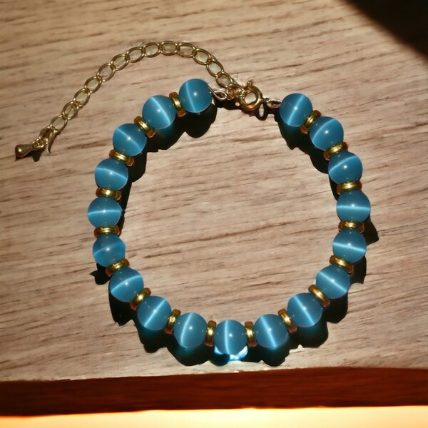 Bracelet en perles oeil de chat, acier inoxydable, ton turquoise et doré, modèle unique, pochette cadeau offerte