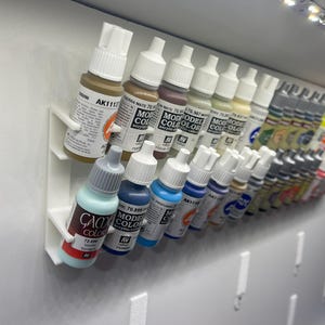 Wall-mounted Paint Rack for Vallejo and Army Painter bottles.
