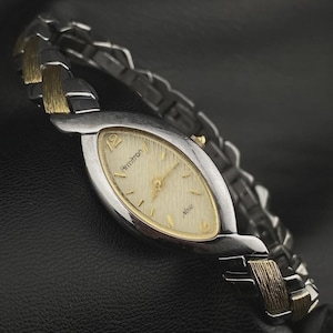 Ladies Silver & Gold Tone Armitron Now Almond Bezel Dainty Minimalistic Watch