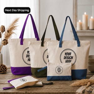 a collection of tote bags and a small bag on a wooden surface, with a "Next Day Shipping" sign above them.