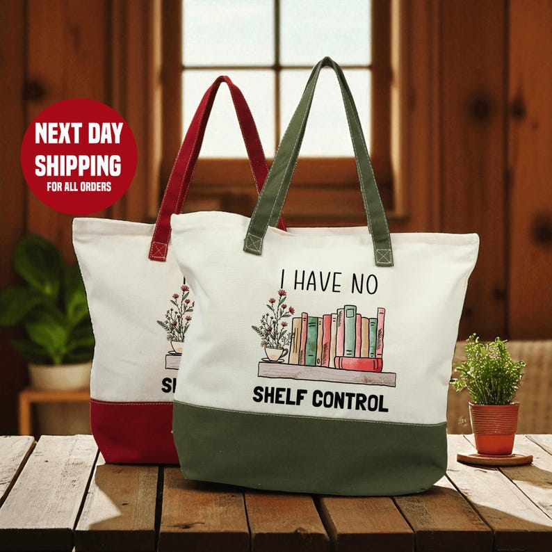 two tote bags with a humorous text printed on them, placed on a wooden surface.
